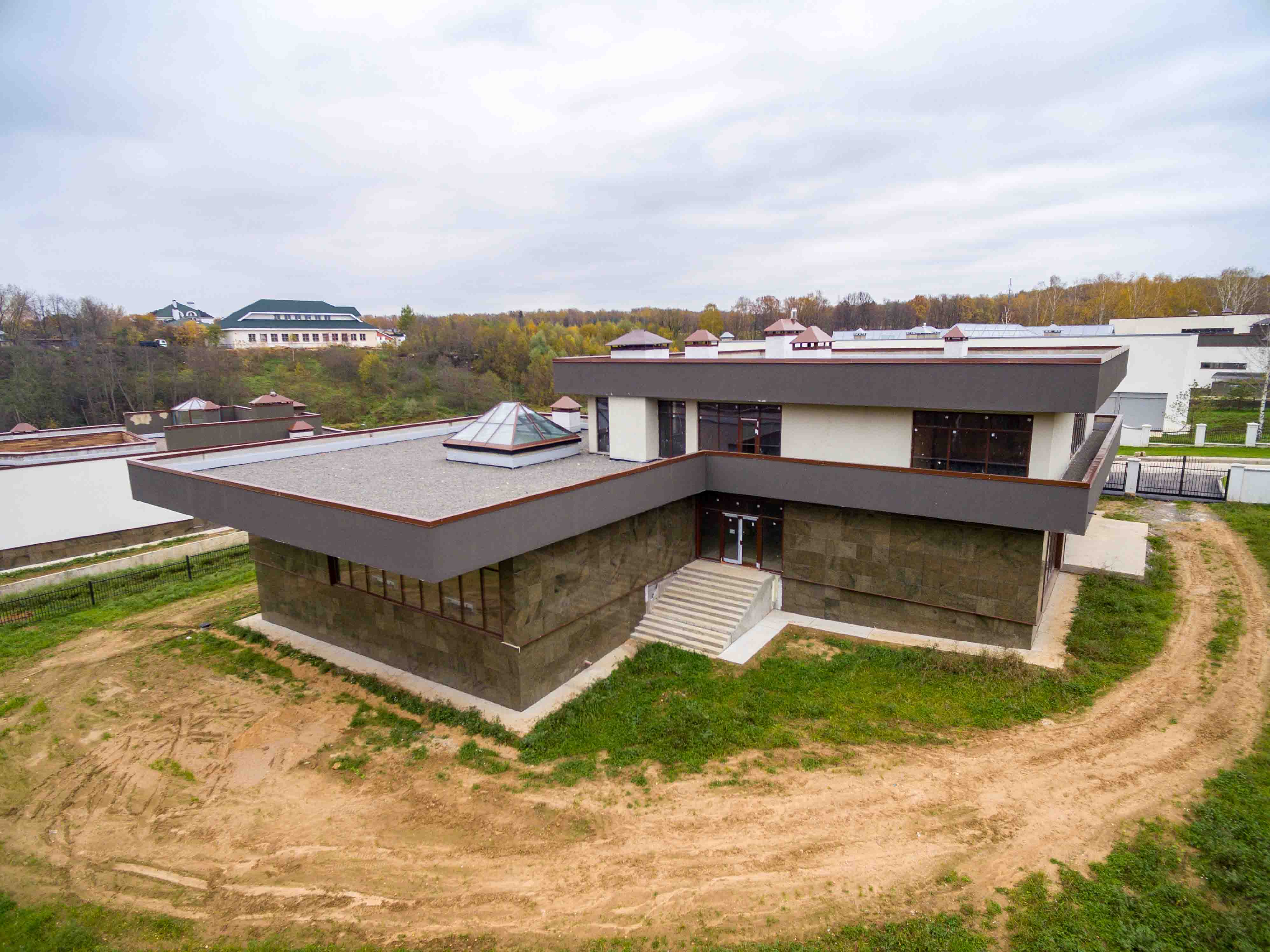 Pitched roof house vs Flat roof house in Kenya